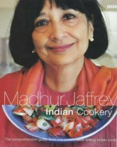 From Madhur Jaffrey,  Indian Cooking With chapters on meat, poultry, fish, vegetables, accompaniments, pulses, relishes, chutneys, and pickles.   recipes include "Rogan Josh, Tandoori-style Chicken, and "Naan Bread, "Salmon Steamed with Mustard Seeds and "Tomato and Drunken Orange Slices. 