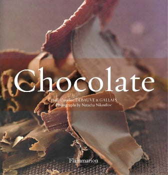 This two-volume set is a must for chocolate lovers. It includes a comprehensive history of chocolate, tips on how to appreciate it, and mouth-watering recipes like Chocolate-Cherry Mousse and Chocolate-Praline Tart. ISBN-13 is ‎978-2080200921 Flammarion.