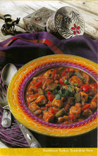 Load image into Gallery viewer, Southwest Turkey Tenderloin Stew in a colorful bowl with decorative elements on a wooden surface.