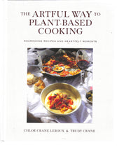 Load image into Gallery viewer, Book cover of &#39;The Artful Way to Plant-Based Cooking&#39; with a photograph of a meal on a table.