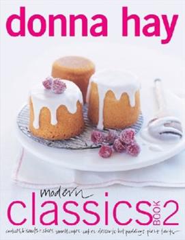 donna hay modern classics 2 pink lettering 3 small white cakes on a plate